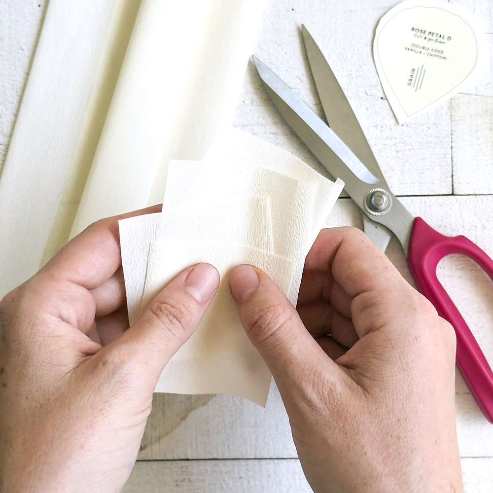 Layering double-sided crepe to cut