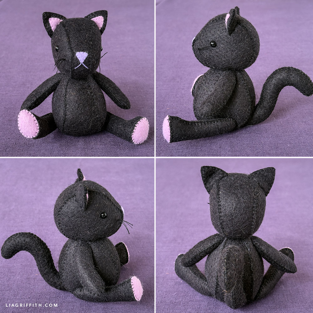 Felt black cat in a purple witch hat and cape