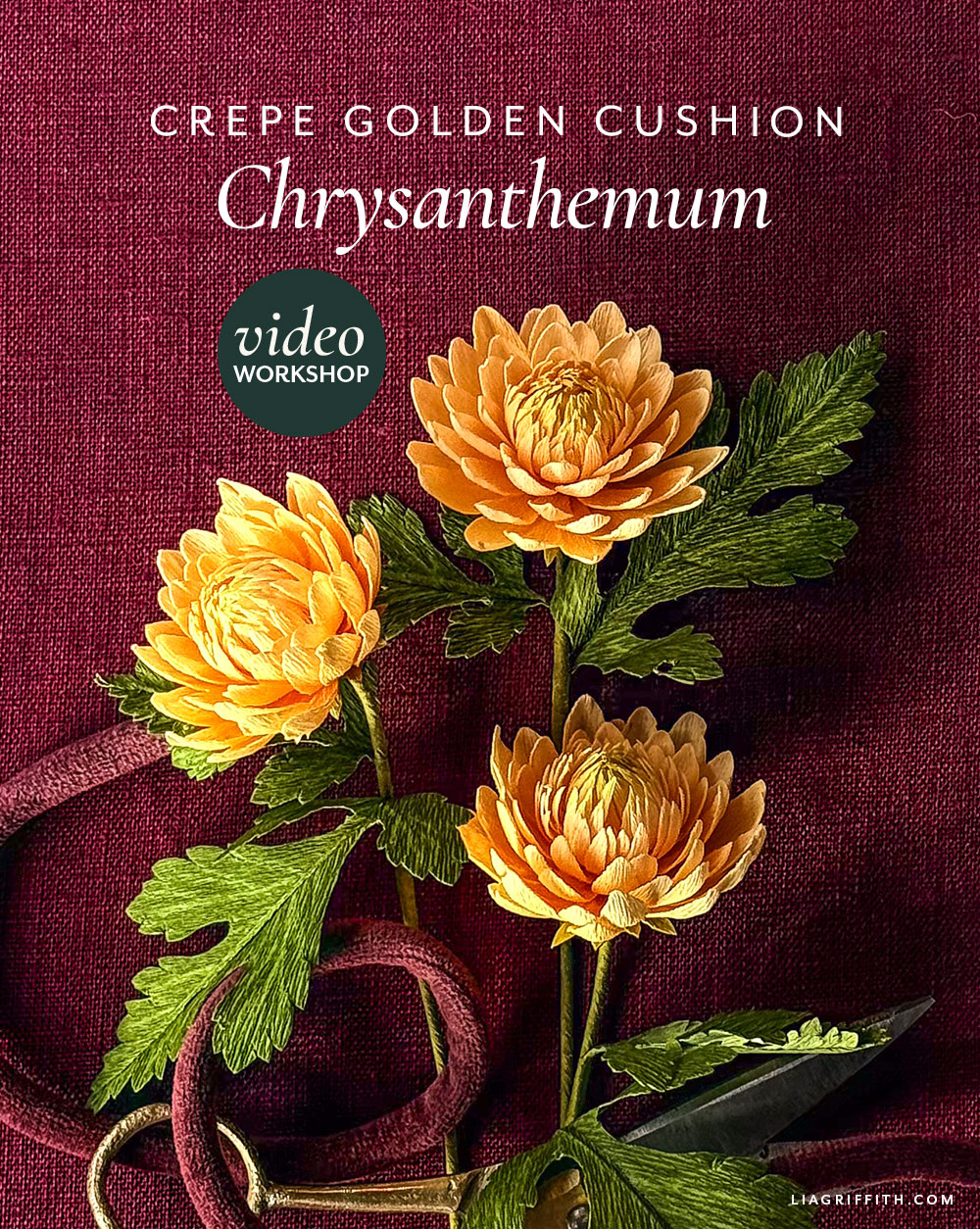 Small golden yellow crepe paper chrysanthemum blooms with green leaves