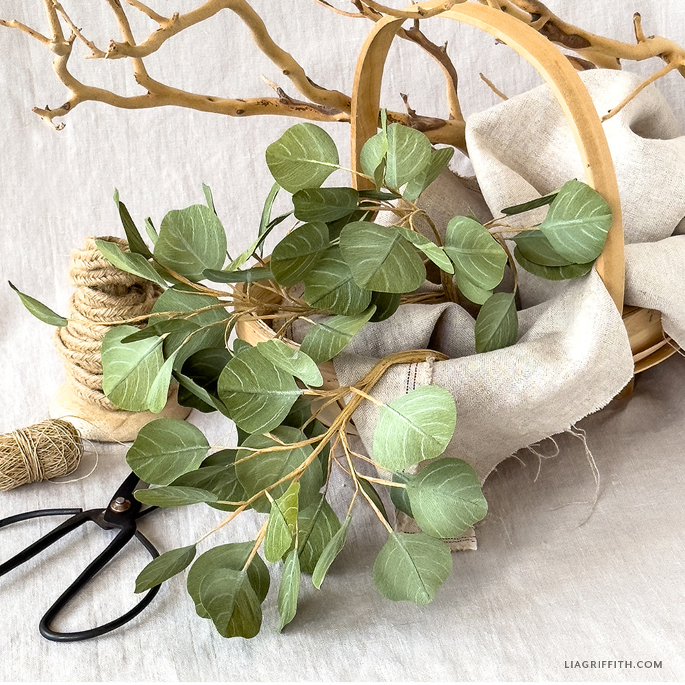 Crepe paper eucalyptus branches with round silver dollar leaves